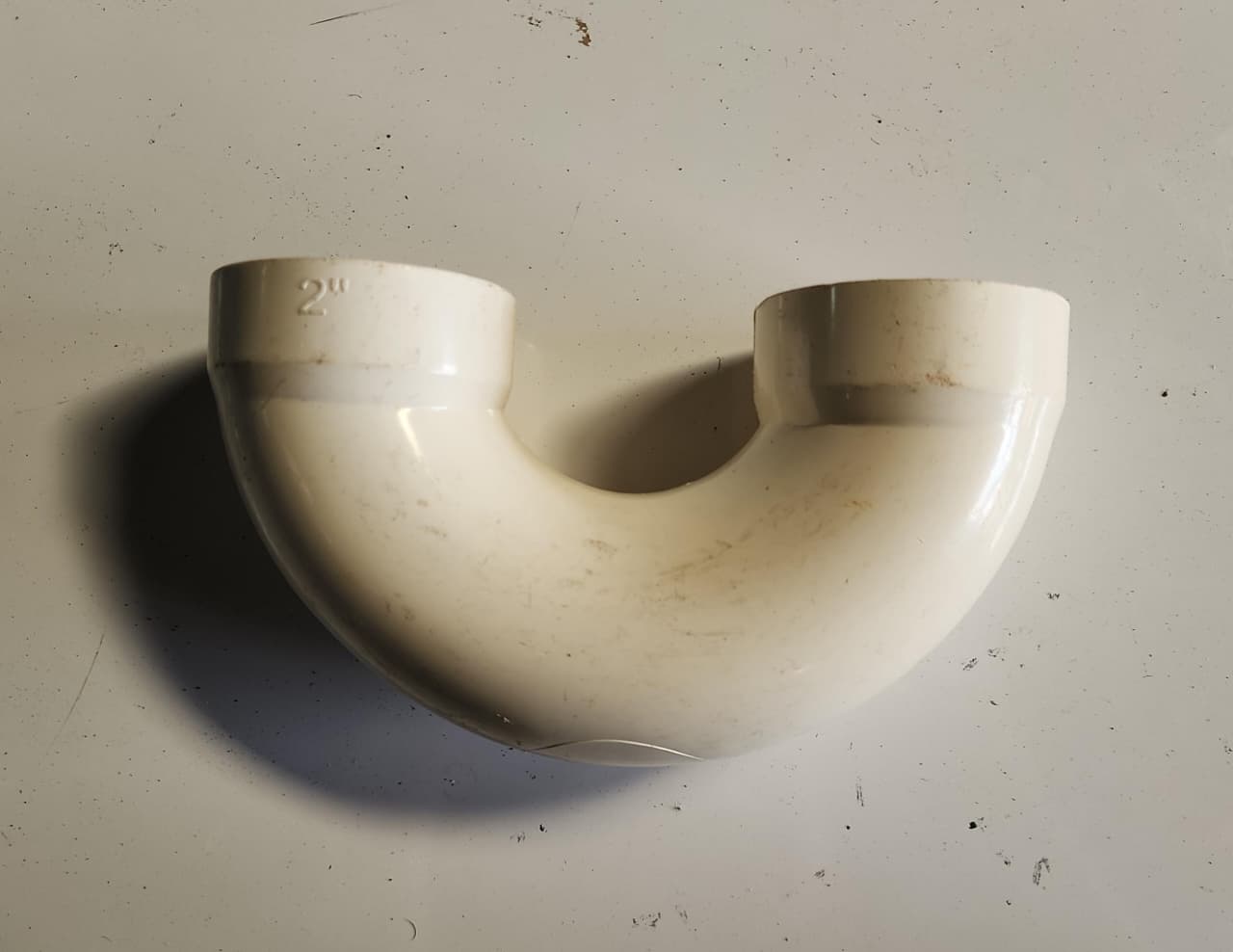 Codo 90 grados o trampa en U de PVC 2 pulgadas