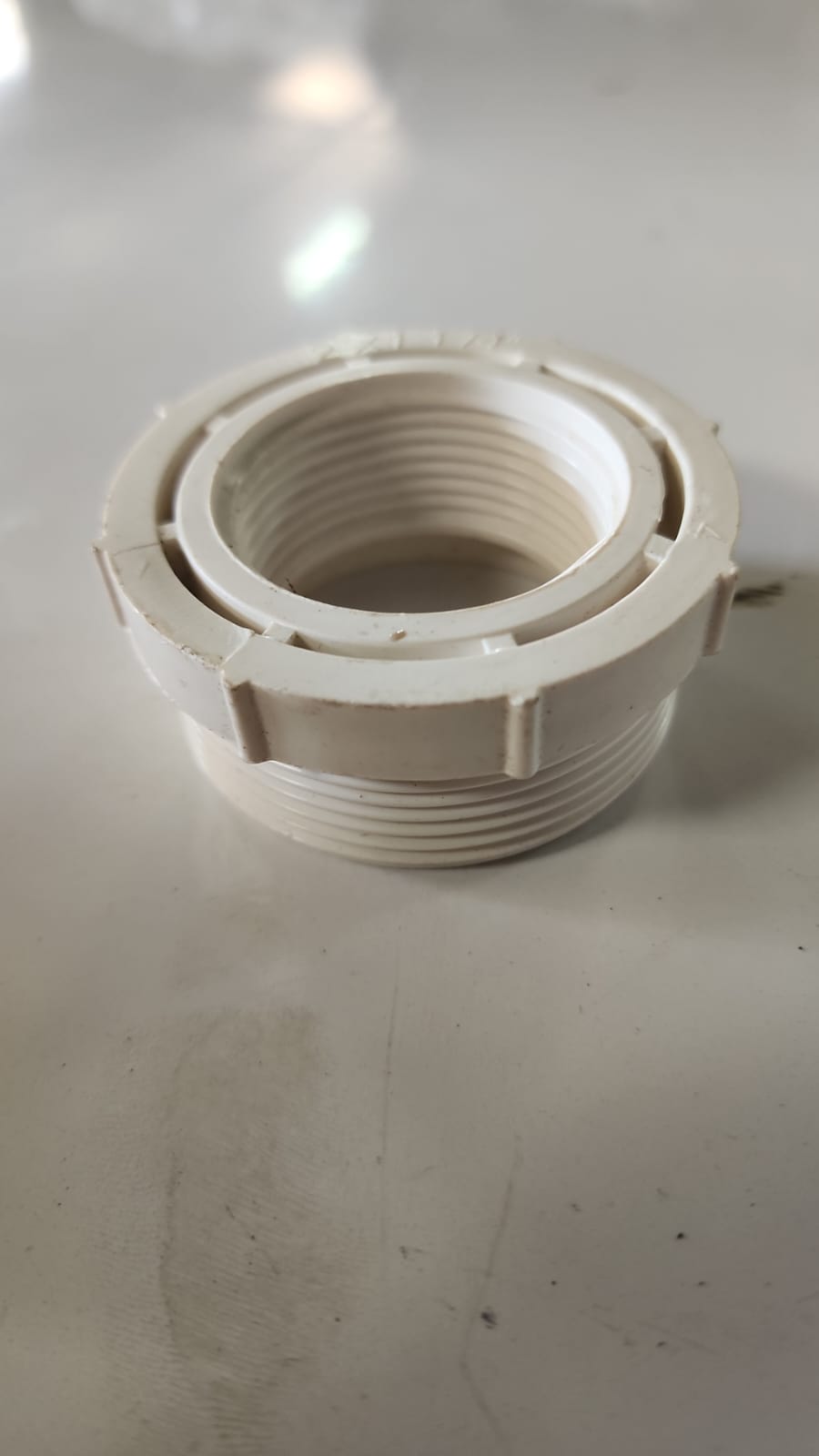 Buje reductor roscado de PVC