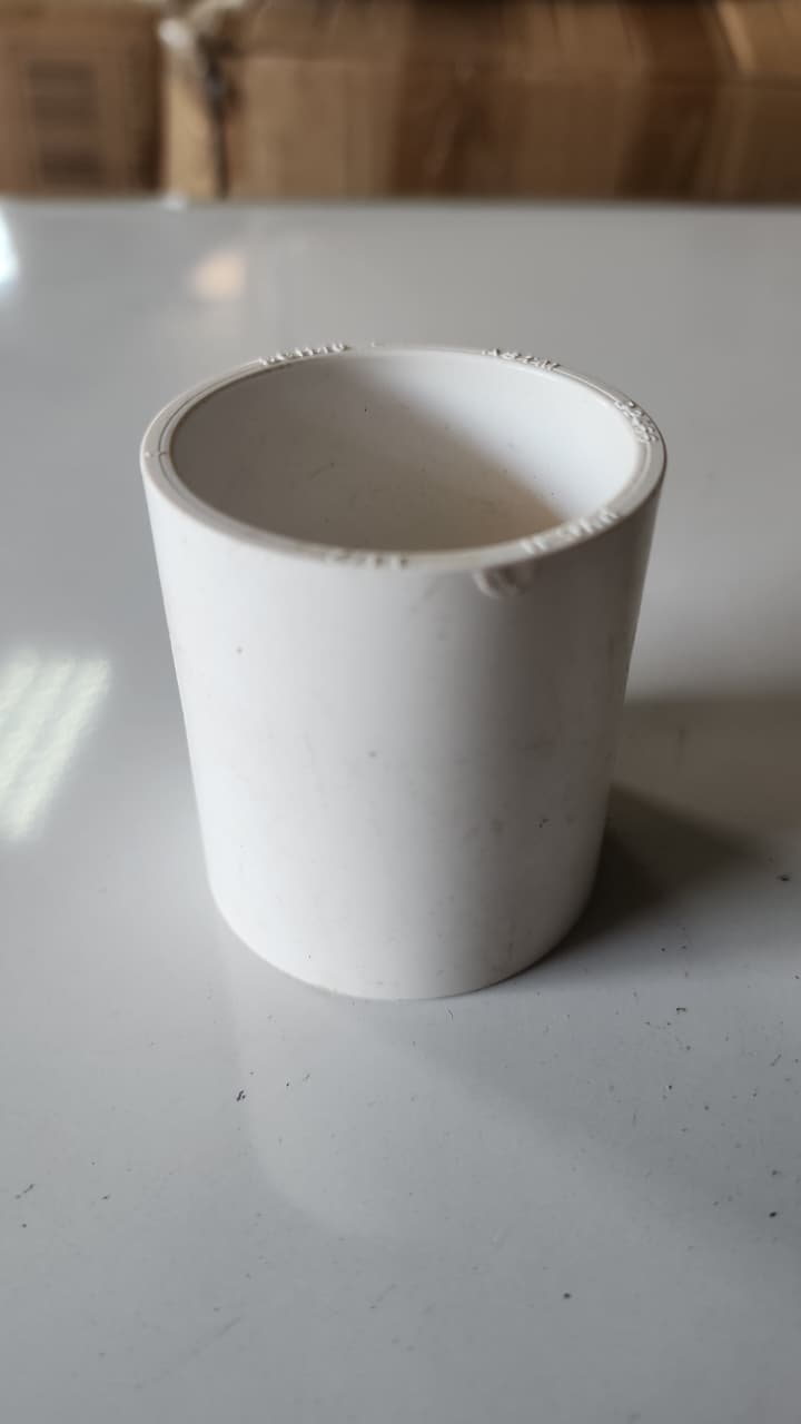 Unión de PVC 1 1/2 pulgadas